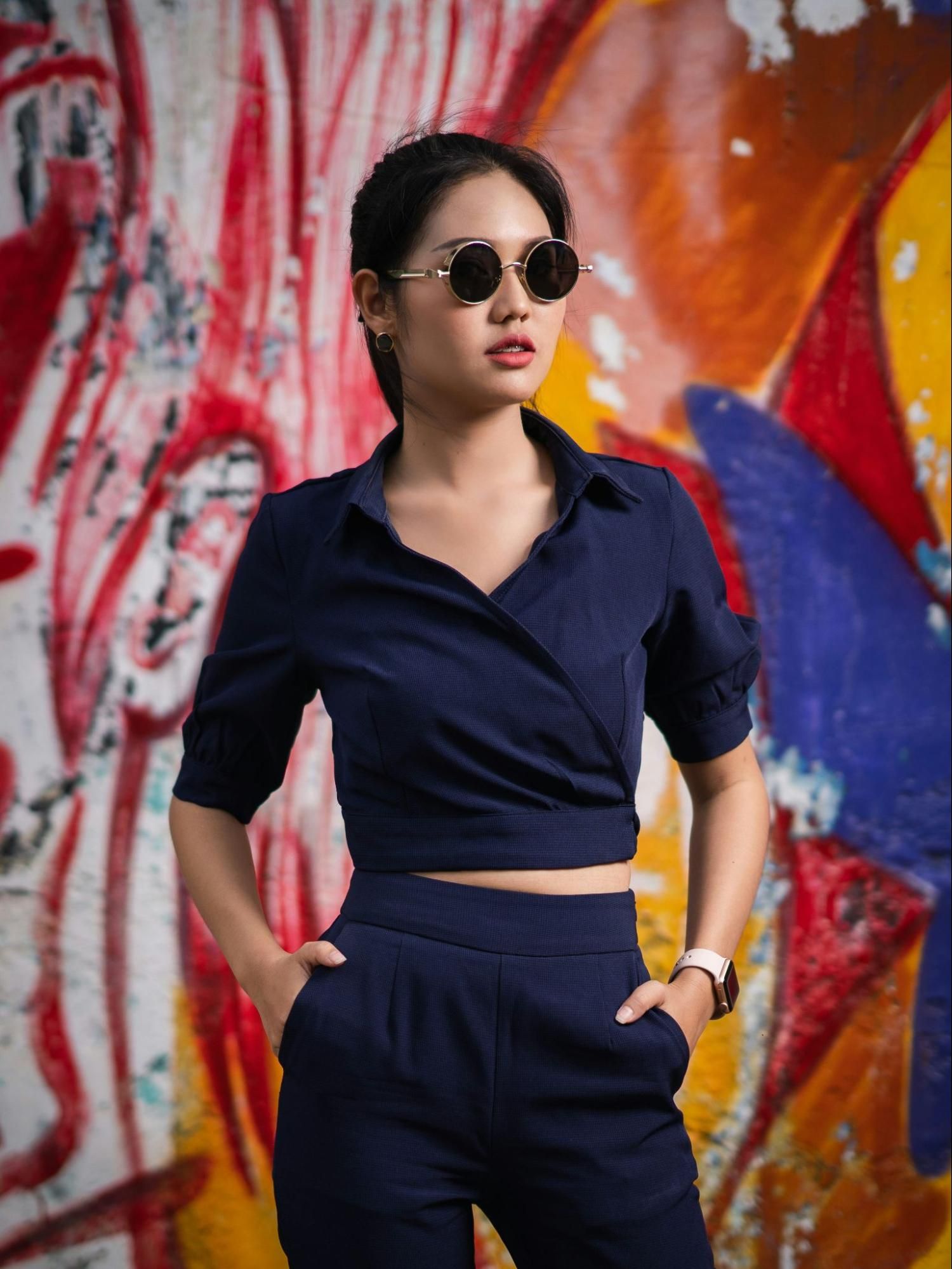 girl in all blue with sun glasses