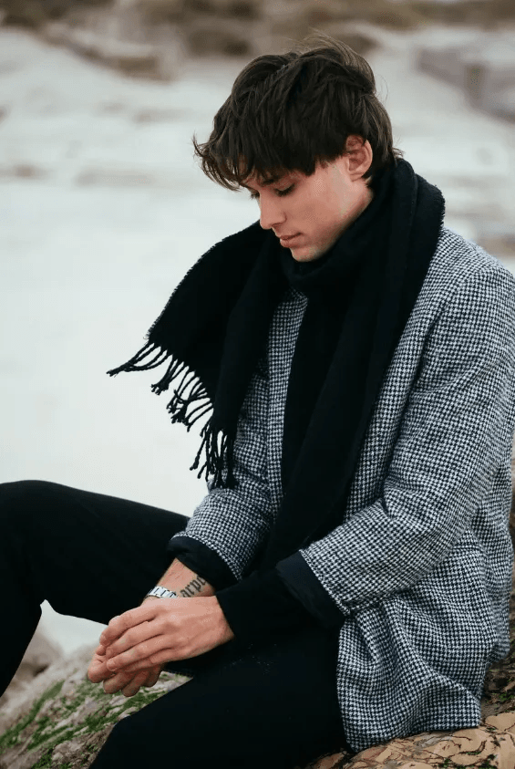 a man wearing a scarf