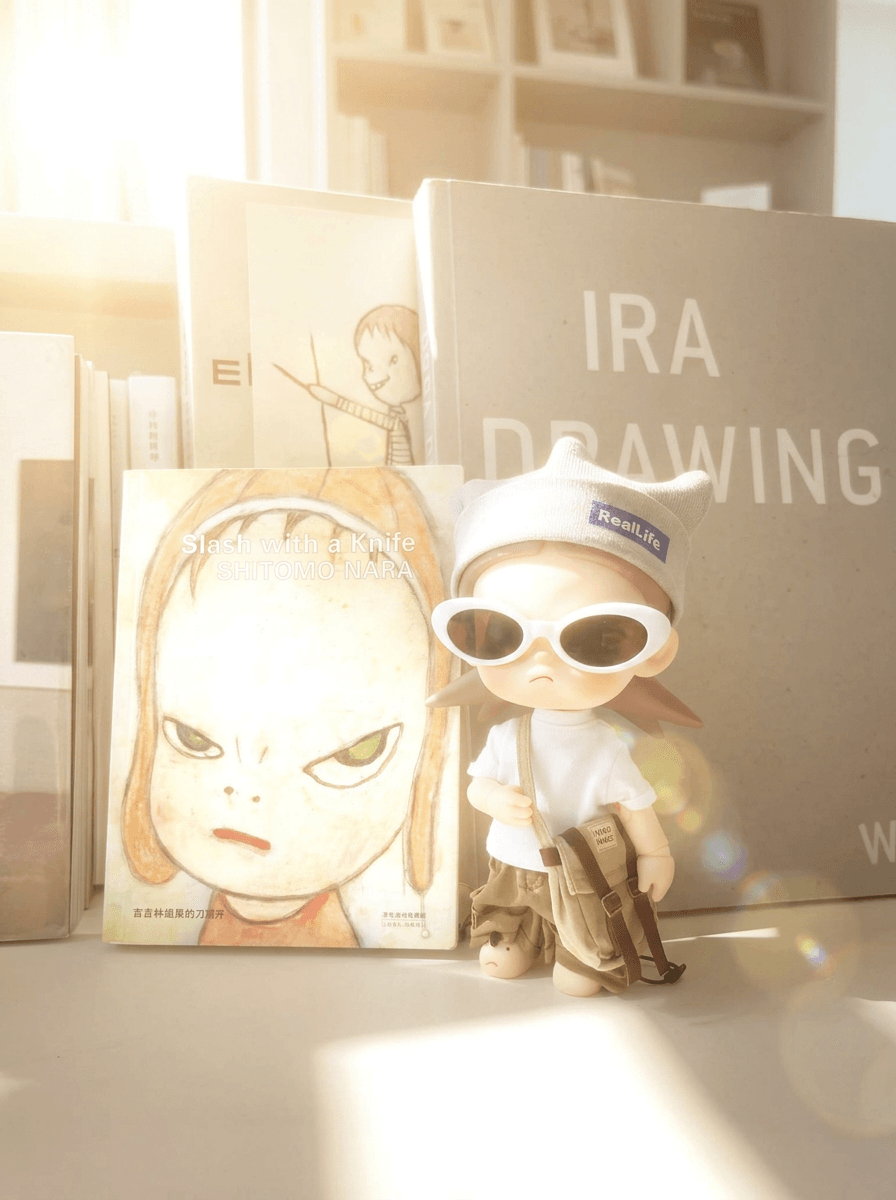 A toy figure with books under sunlight and lens flare